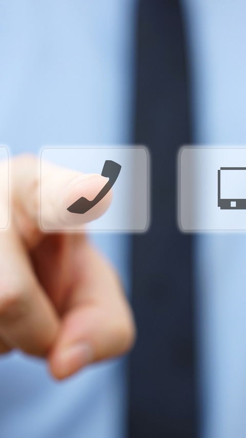 businessman pressing phone button, company identification icons